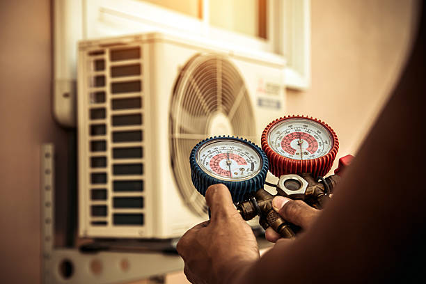 Professional Hvac technician working in White Mills, KY